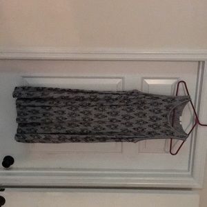 2 super soft flowy dresses, 1 is grey and black and the other is a dark grey